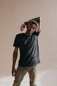 Black man modeling in a studio