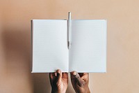 Woman writing in a notebook