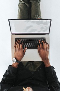 Man using a laptop device