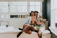 Black couple using a tablet together