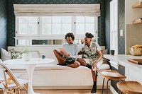 Black couple using a tablet together