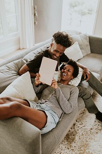Black couple using a tablet together