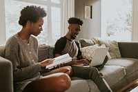 Happy black people using a laptop