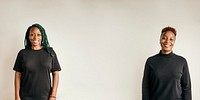 Black lesbian couple wearing black tops