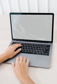 Woman using a laptop mockup