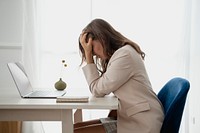 Depressed businesswoman overwhelming with her work