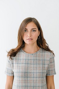 Young woman wearing a plaid t-shirt