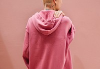 Cool woman in a pink hoodie