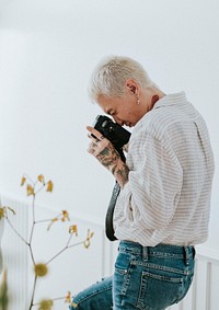 Cool photographer doing a photoshoot at home