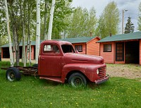 Vintage truck outside the Black and Orange &quot;Garage Camp,&quot; an authentic 1930s-vintage tourist court, refurbished in 2009, along the Lincoln Highway, old U.S. 30, in Fort Bridger -- a tiny town that grew up around a historic fort, now a state historic site, of the same name in Uinta County, Wyoming.