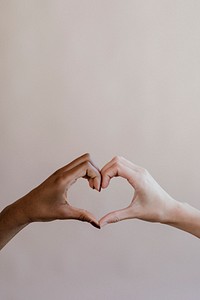 Diverse cute heart shaped hands