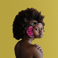 Black woman with flowers on her face