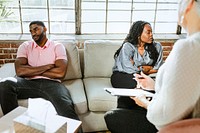 Black couple having a marriage counseling with therapist