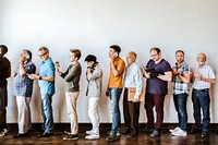 Busy diverse men standing in a line