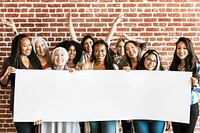 Group of diverse women showing a blank banner mockup