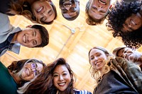 Group of diverse people with smiling faces from below view