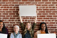 Diverse women showing blank posters template