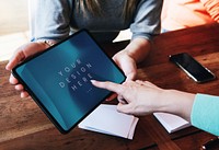 Woman pointing on a digital tablet screen mockup