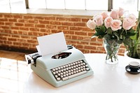 Retro light blue pastel typewriter