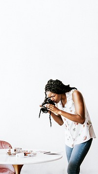 Female photographer shooting beauty products on the table