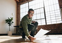 Businessman planning a marketing strategy on a wooden floor