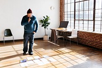 Businessman planning a marketing strategy on a wooden floor