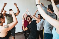 Diverse cheerful active people in a studio
