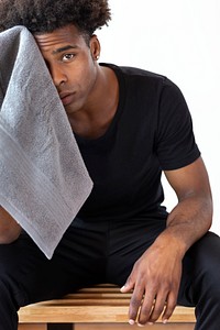 Exhausted man taking a break after workout