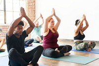 Diverse people in yoga class