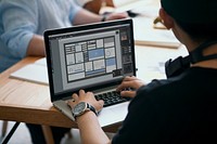 Businesswoman working on a laptop screen mockup