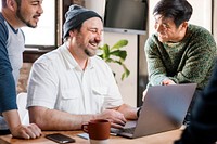 IT officer talking with his colleagues in the office