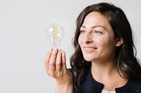 Woman holding a light bulb