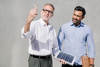 Eco-friendly engineering team with the solar panel