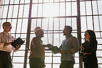 Business people greeting by shake hands