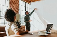 Businessman presenting in a meeting