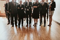 Business people standing as a perfect team