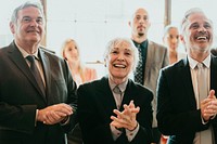 Diverse business people applauding with joy