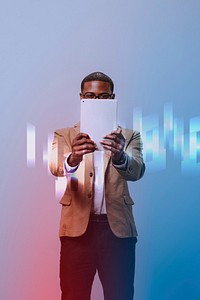 Businessman holding a tablet in front of his face mockup