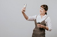 Happy woman taking a picture of herself