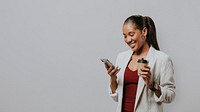 Happy woman in a blazer with a phone