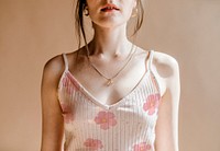 Woman in a light pink tank top mockup