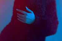 Cool bride in a black fluffy sweater with a blue effect