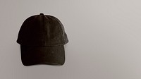 Black cap mockup on brown background