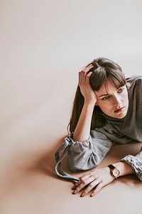 Brown hair model posing in a studio