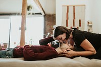 Cheerful couple on the bed