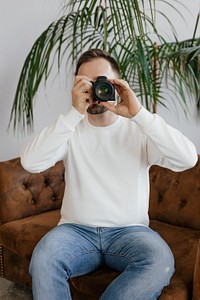 Professional photographer shooting at home