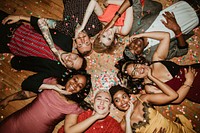 Group of friends lying on the floor at a party