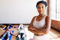 Trainer and her students in a yoga class