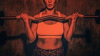 Woman weightlifting with a barbell wallpaper<br /> 