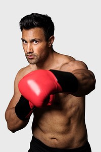 Muscular male boxer with the red boxing gloves mockup